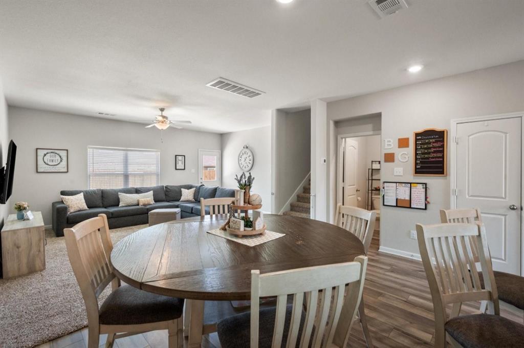 159 Sammy Fowler Avenue Venus, TX 76084 - Photo 11 of 36 a view of a dining room with furniture