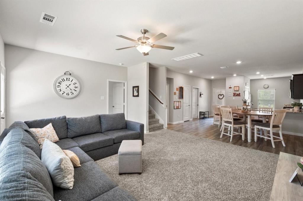159 Sammy Fowler Avenue Venus, TX 76084 - Photo 15 of 36 a living room with furniture and a table