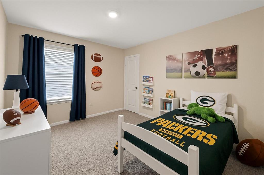 159 Sammy Fowler Avenue Venus, TX 76084 - Photo 26 of 36 a bedroom with a bed and a window