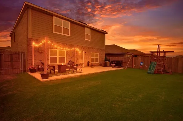 a view of a house with a patio