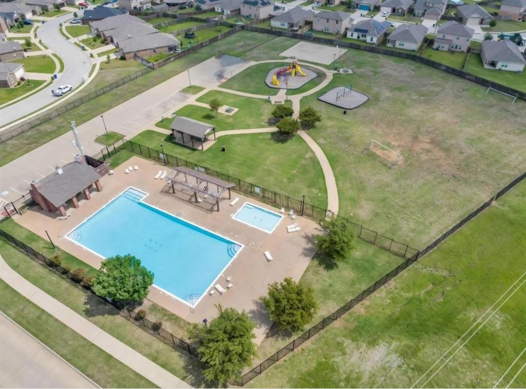 159 Sammy Fowler Avenue Venus, TX 76084 - Photo 34 of 36 an aerial view of a house with a swimming pool
