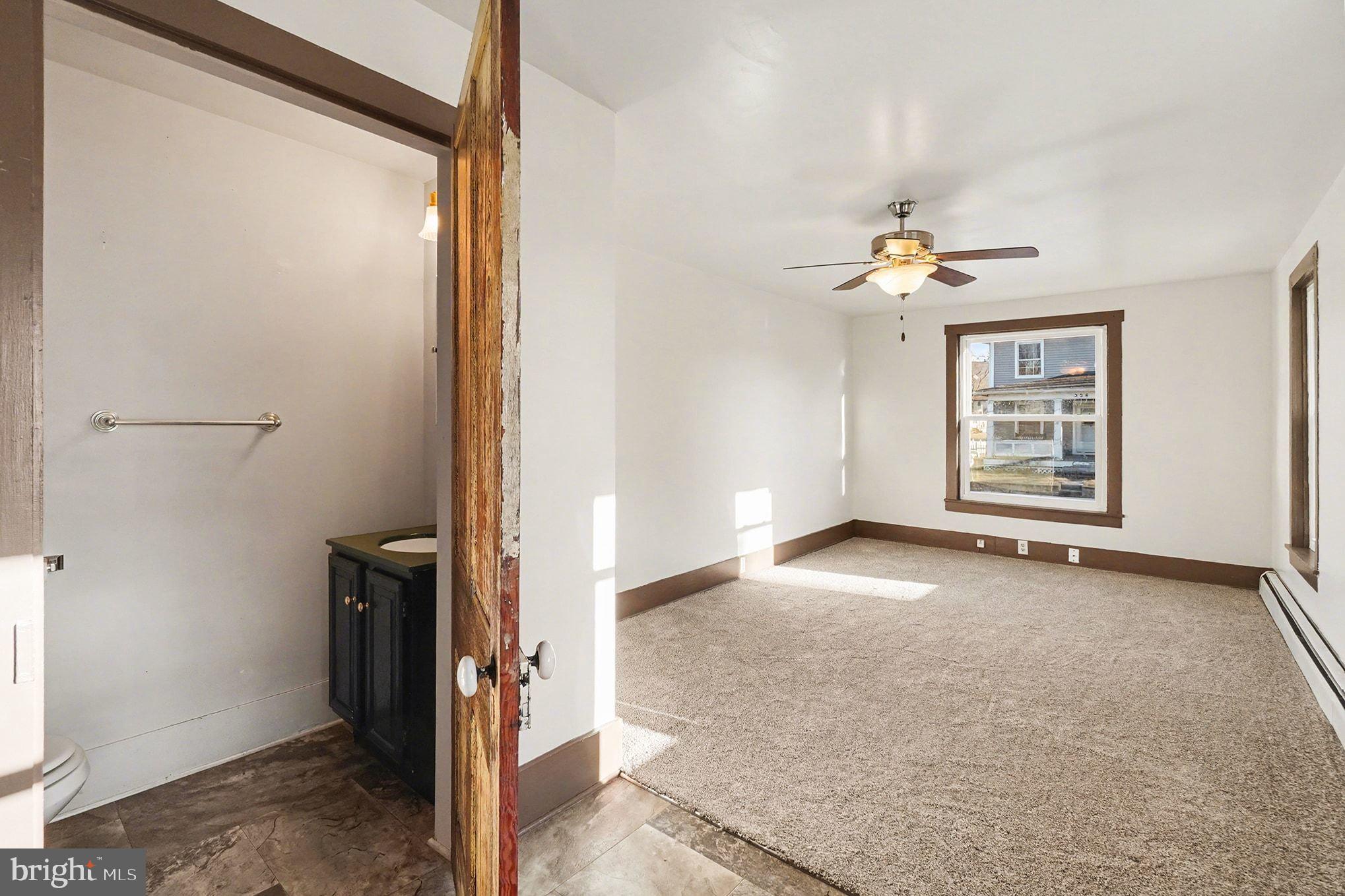 325 East Market Street Beavertown, PA 17813 - Photo 18 of 41 325 1st Floor Living Room and 1/2 bath.