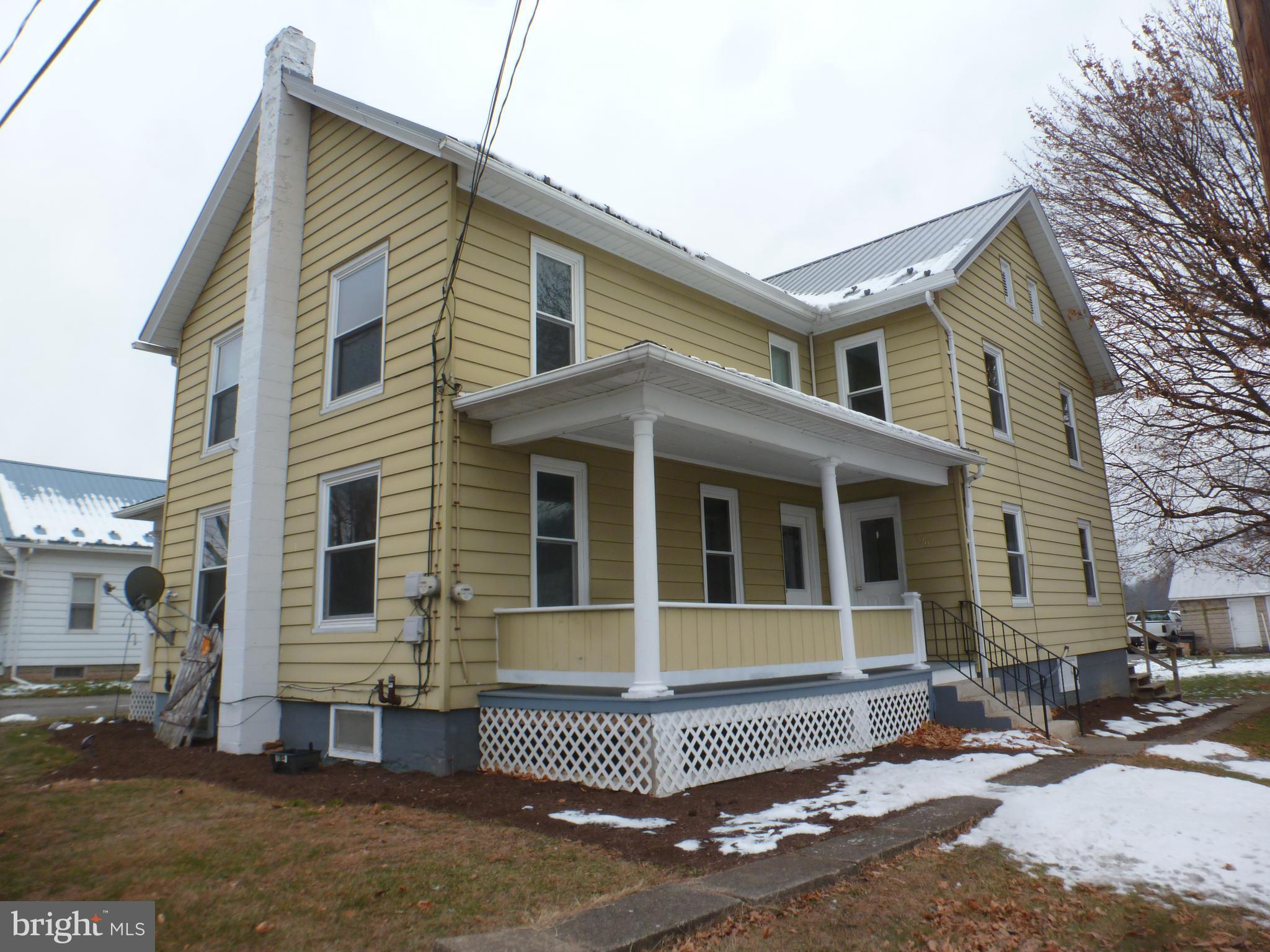 325 East Market Street Beavertown, PA 17813 - Photo 39 of 41 #329 side covered porch. Relax weather protection.
