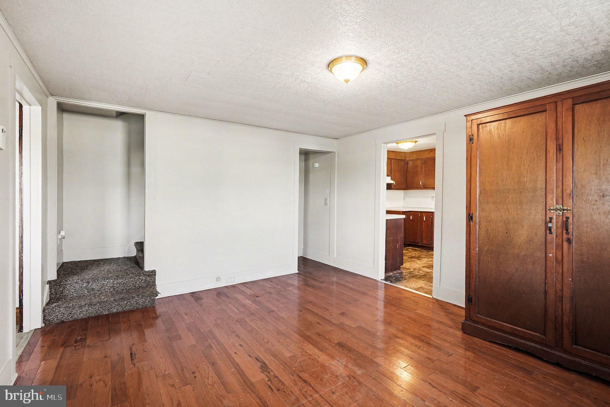 325 East Market Street Beavertown, PA 17813 - Photo 7 of 41 329 Formal Dining Room/ Den. Hardwood Floor.