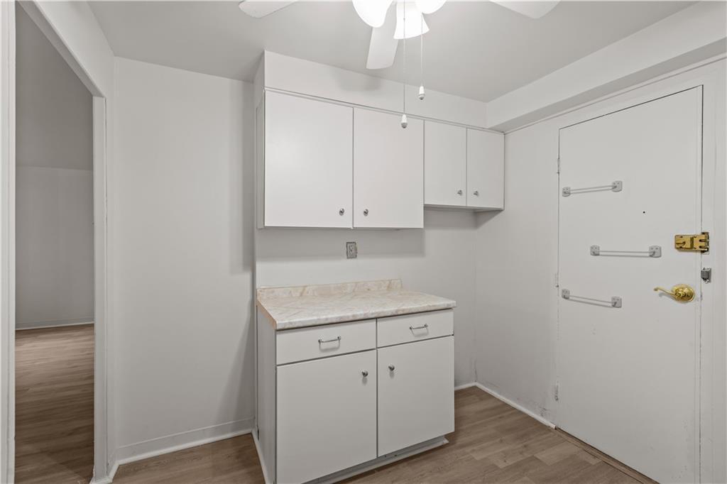 4625 Fifth Avenue, Unit 209 Pittsburgh, PA 15213 - Photo 15 of 23 a view of cabinets with wooden floor