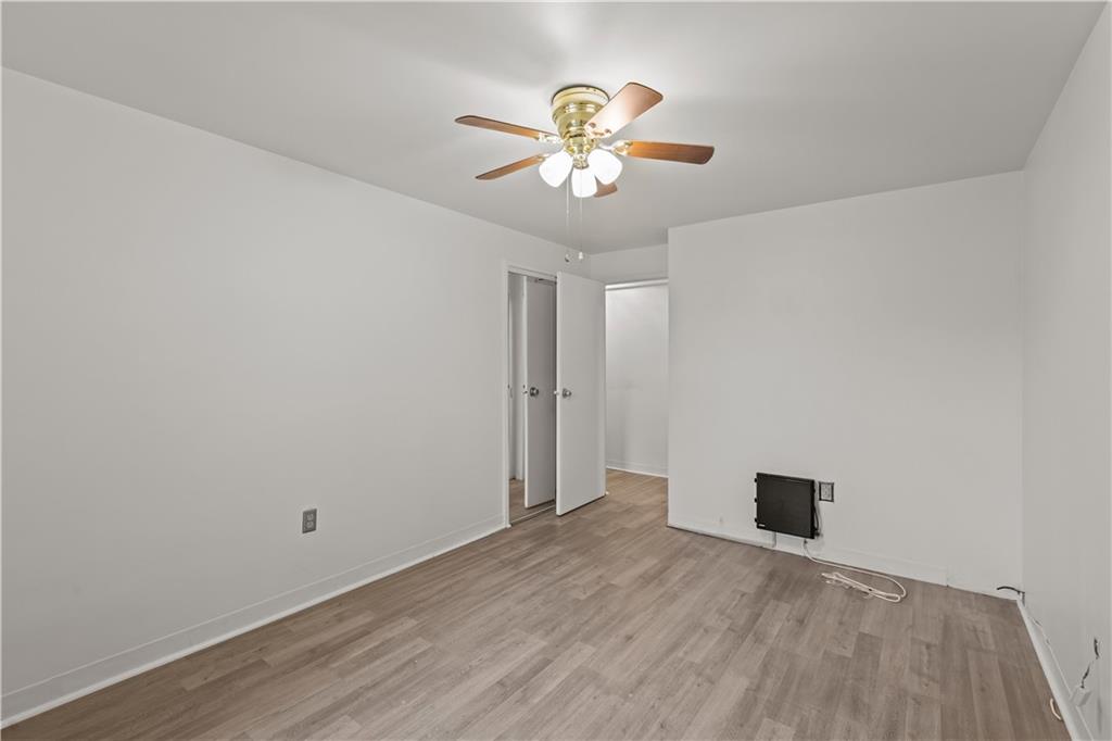 4625 Fifth Avenue, Unit 209 Pittsburgh, PA 15213 - Photo 19 of 23 a view of an empty room with a window