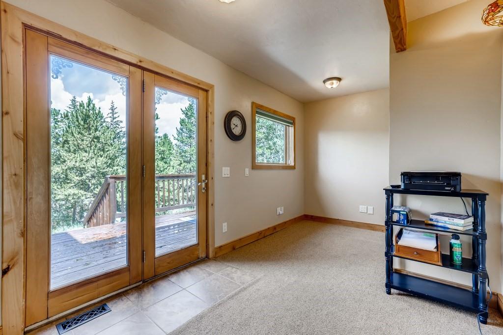 72 Aa Road Silverthorne, CO 80498 - Photo 22 of 28 a view of room with window and ceiling fan