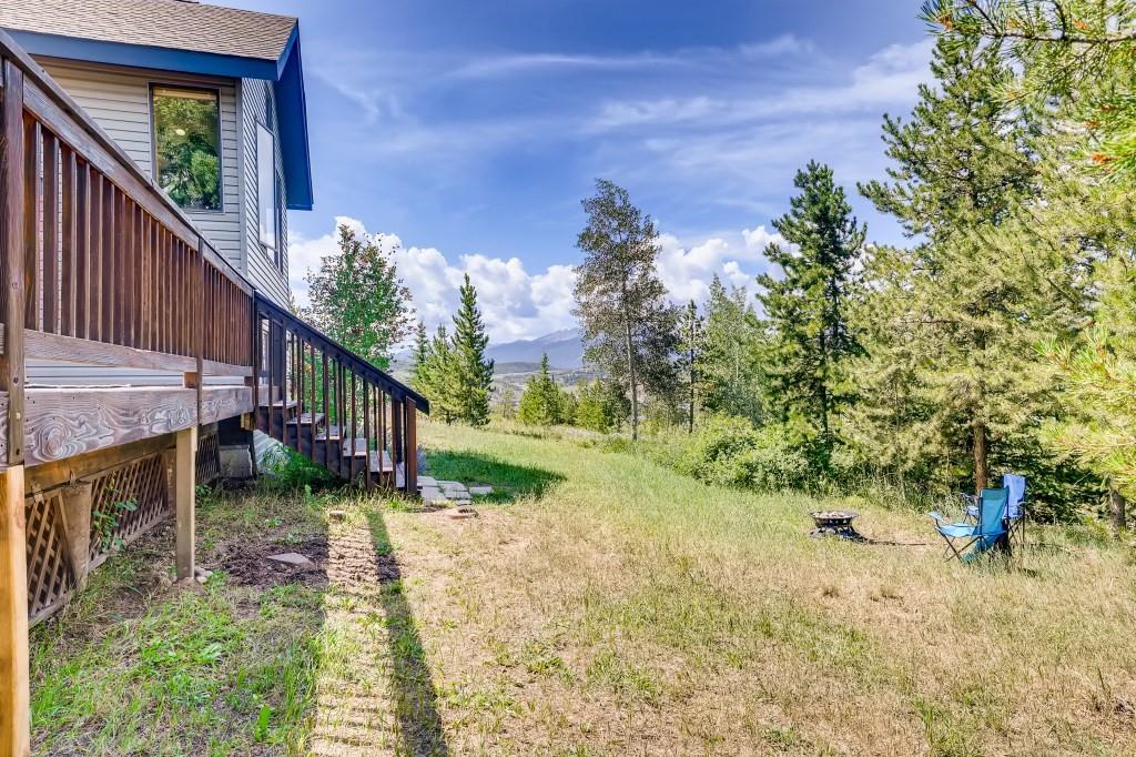 72 Aa Road Silverthorne, CO 80498 - Photo 24 of 28 a backyard of a house with lots of green space