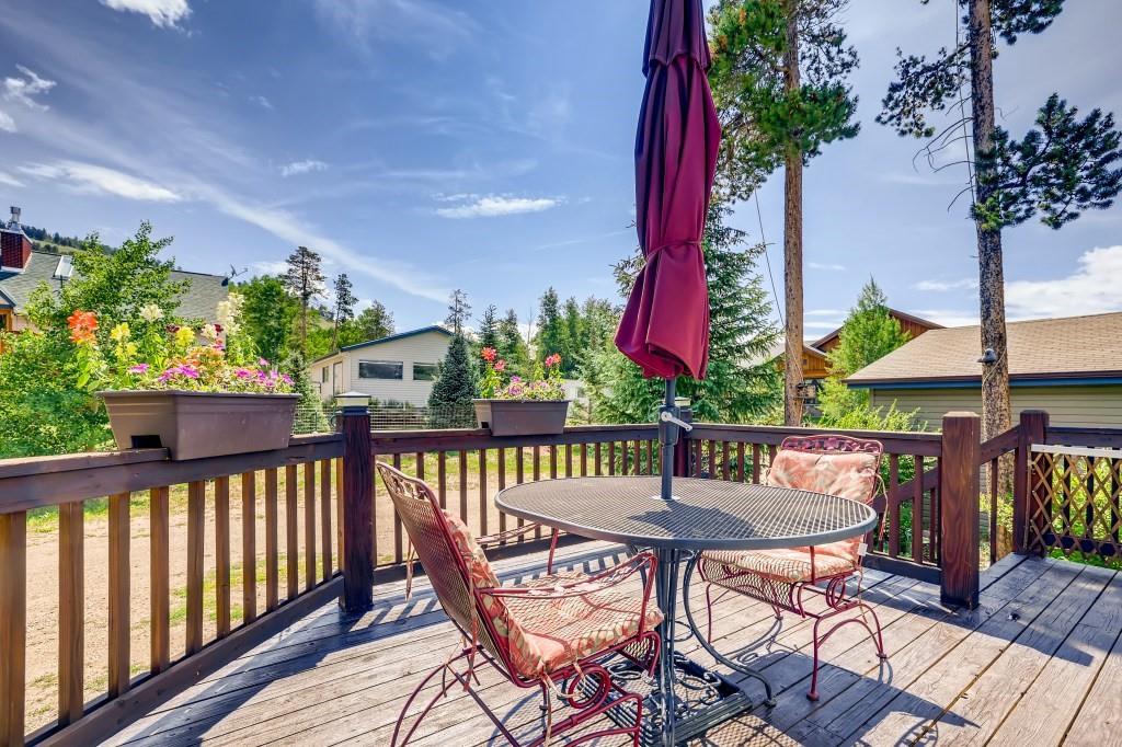 72 Aa Road Silverthorne, CO 80498 - Photo 4 of 28 a view of a chairs and table in patio with wooden floor
