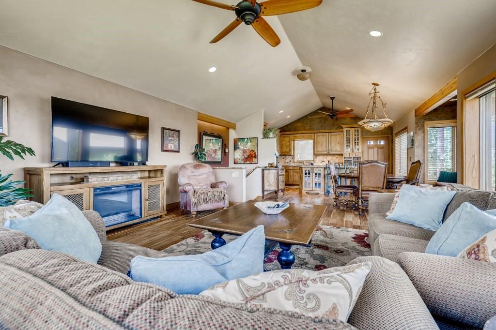72 Aa Road Silverthorne, CO 80498 - Photo 8 of 28 a living room with furniture and a flat screen tv