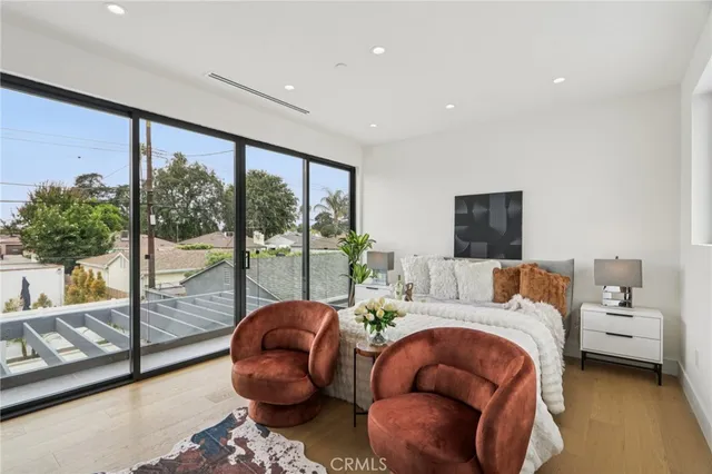 a bathroom with a sink a mirror and a shower