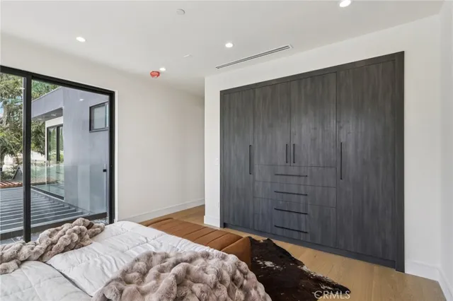 a view of a house with a yard and stairs
