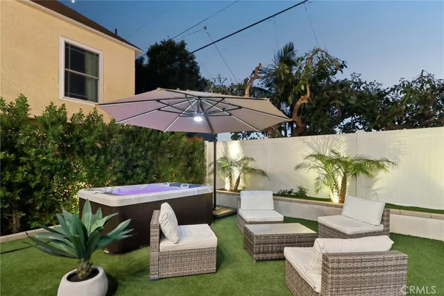 a view of yard with patio