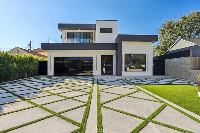 a front view of a house with a porch