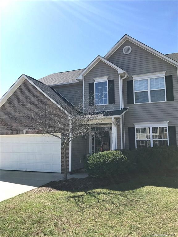 36 Wildbriar Road, Unit 2 Fletcher, NC 28732 - Photo 1 of 12 a front view of a house with garden