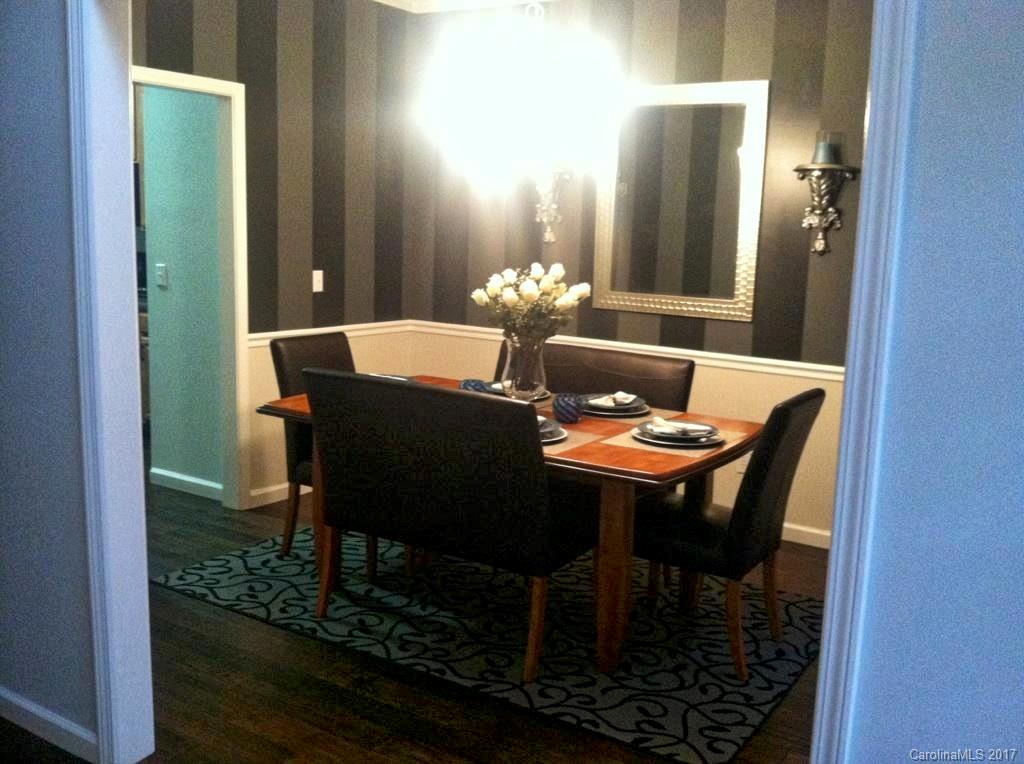 36 Wildbriar Road, Unit 2 Fletcher, NC 28732 - Photo 3 of 12 a dining room with furniture and wooden floor