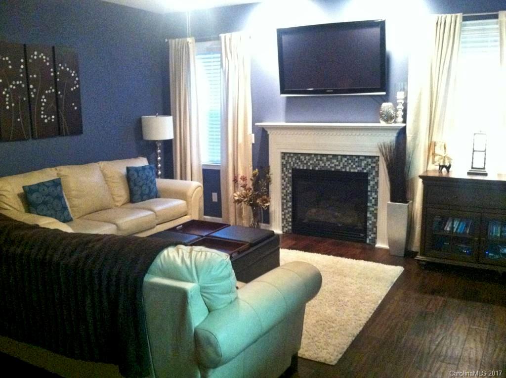 36 Wildbriar Road, Unit 2 Fletcher, NC 28732 - Photo 4 of 12 a living room with furniture and a fireplace