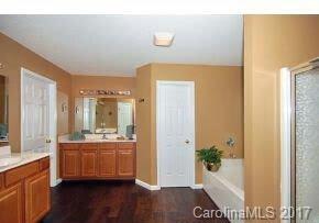 36 Wildbriar Road, Unit 2 Fletcher, NC 28732 - Photo 10 of 12 a bathroom with a bathtub and a sink