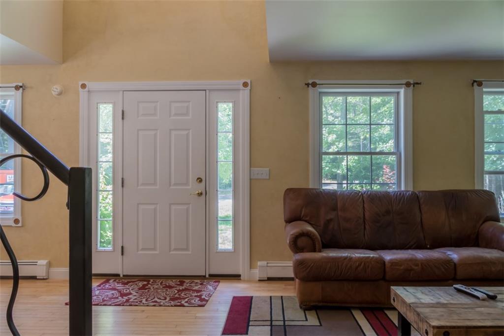941 Lewis Hill Road Bowdoin, ME 04287 - Photo 4 of 35 Enter through the front door, where...
