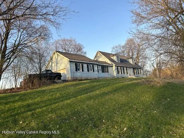 a view of house with garden