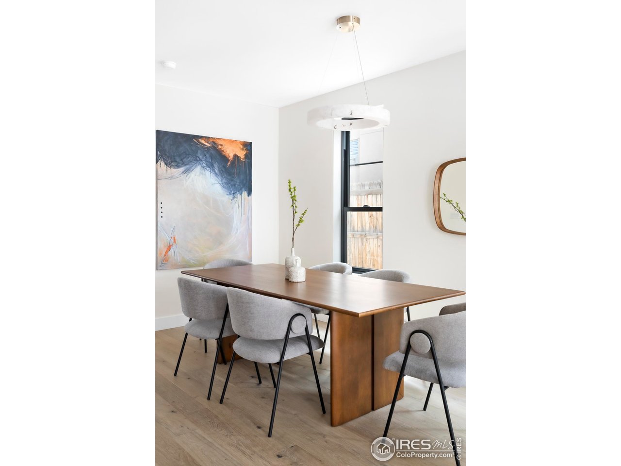 855 Eudora Street Denver, CO 80220 - Photo 11 of 37 a view of a room with a table and chairs