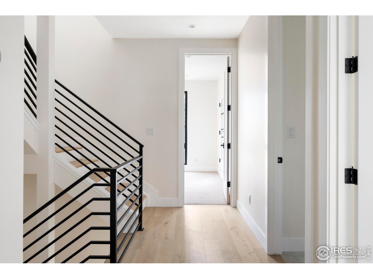 855 Eudora Street Denver, CO 80220 - Photo 16 of 37 a view of an entryway with wooden floor