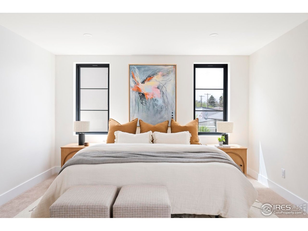 855 Eudora Street Denver, CO 80220 - Photo 17 of 37 a bedroom with a bed and a large window