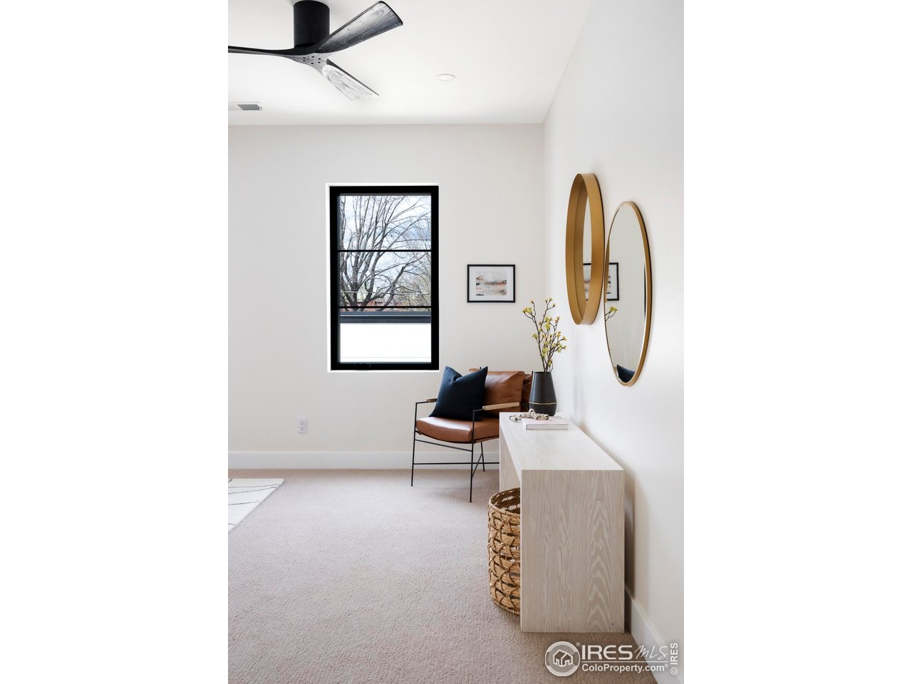 855 Eudora Street Denver, CO 80220 - Photo 18 of 37 a living room with furniture and a window