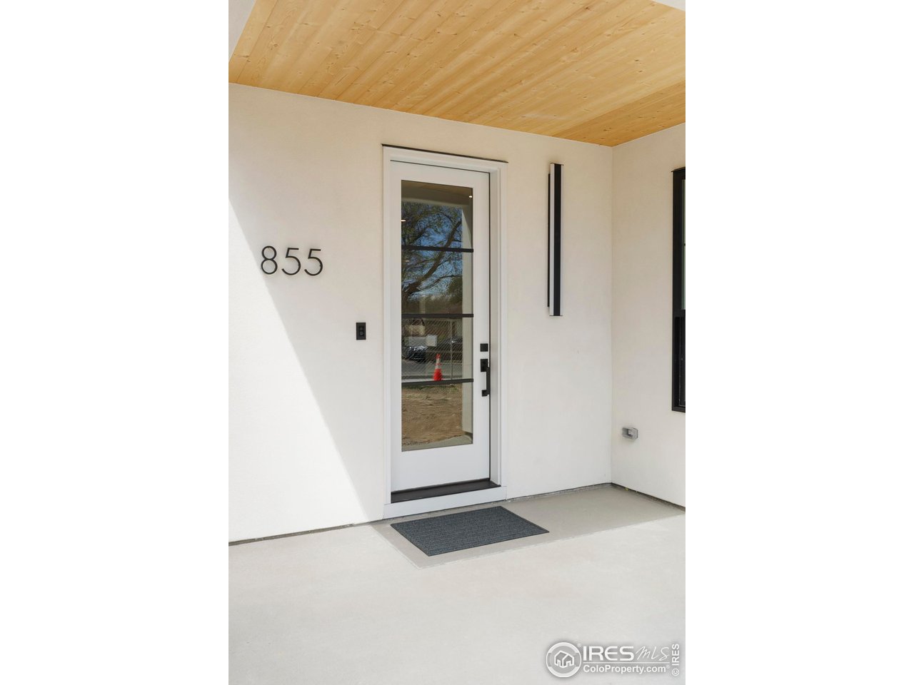 855 Eudora Street Denver, CO 80220 - Photo 2 of 37 a view of a hallway with closet