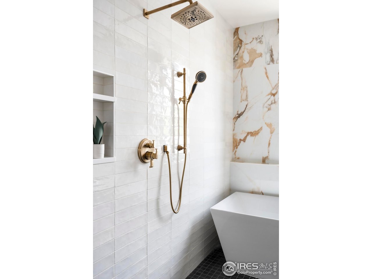 855 Eudora Street Denver, CO 80220 - Photo 22 of 37 a bathroom with a shower