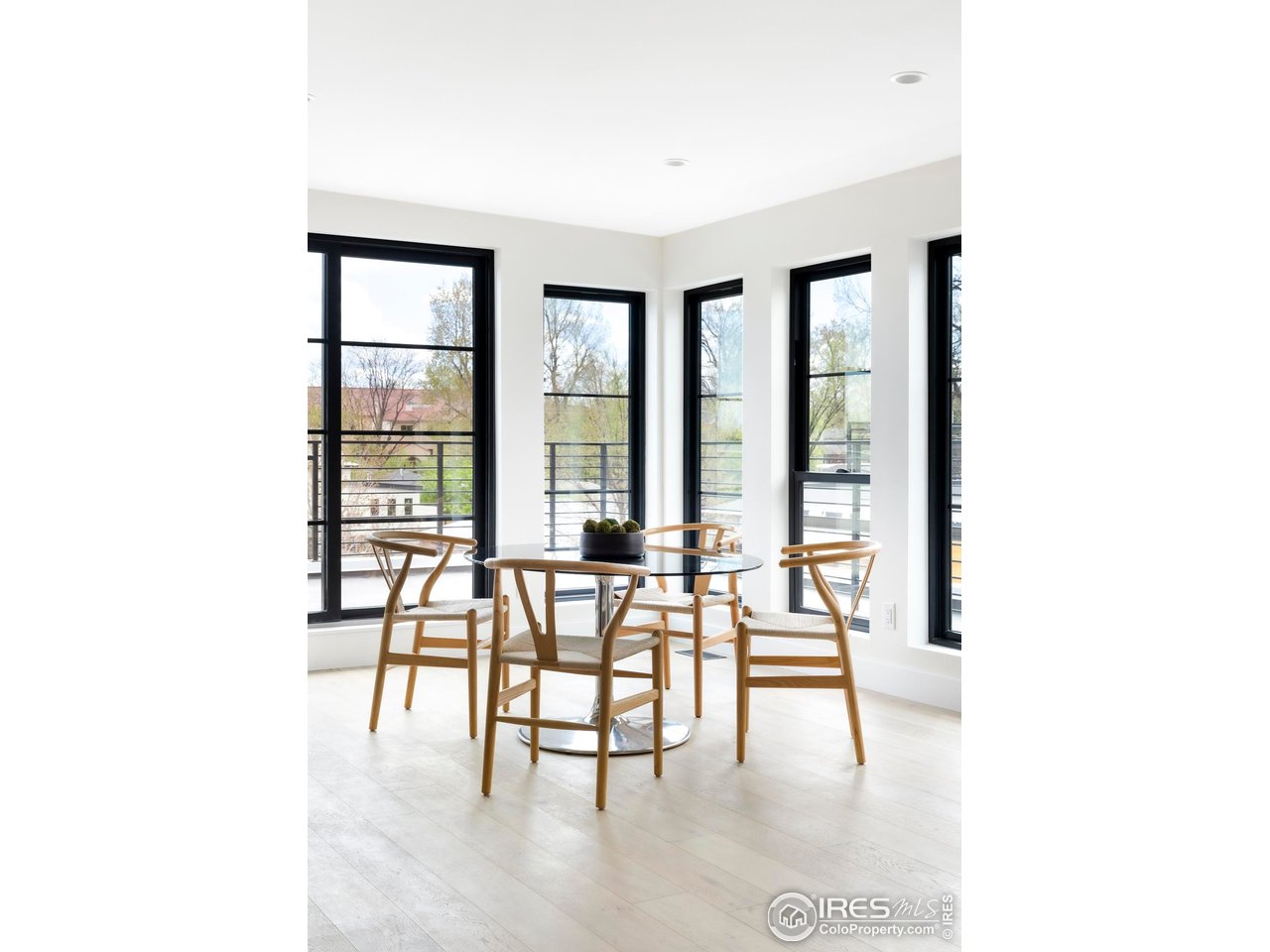855 Eudora Street Denver, CO 80220 - Photo 29 of 37 a view of a livingroom with furniture and floor to ceiling window