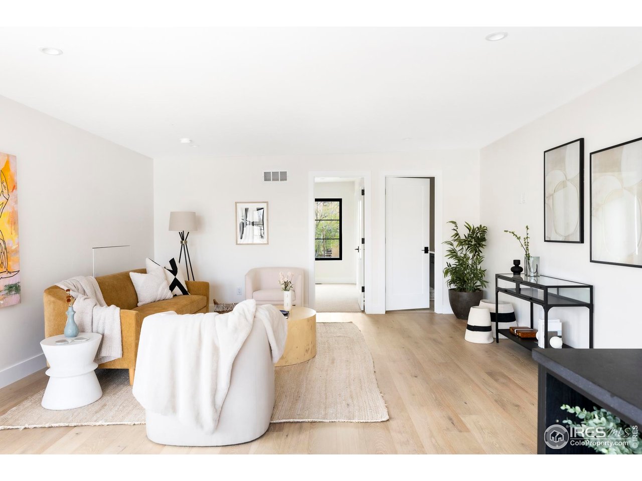 855 Eudora Street Denver, CO 80220 - Photo 30 of 37 a living room with furniture and a table