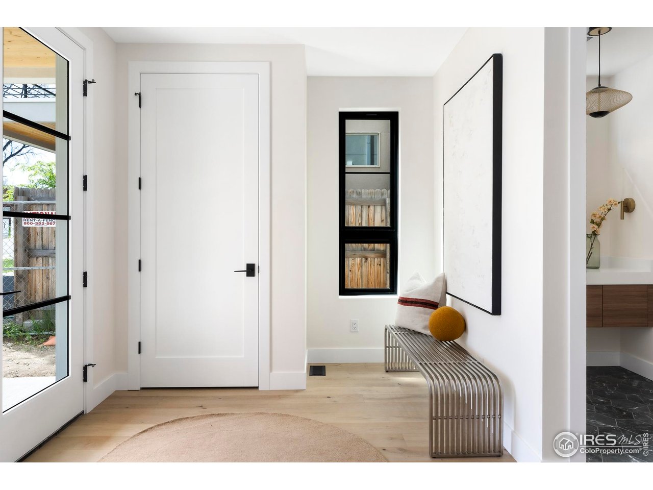 855 Eudora Street Denver, CO 80220 - Photo 3 of 37 a bedroom with a bed and a window