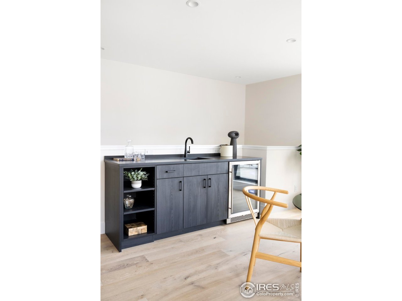 855 Eudora Street Denver, CO 80220 - Photo 32 of 37 a living room with furniture and a table