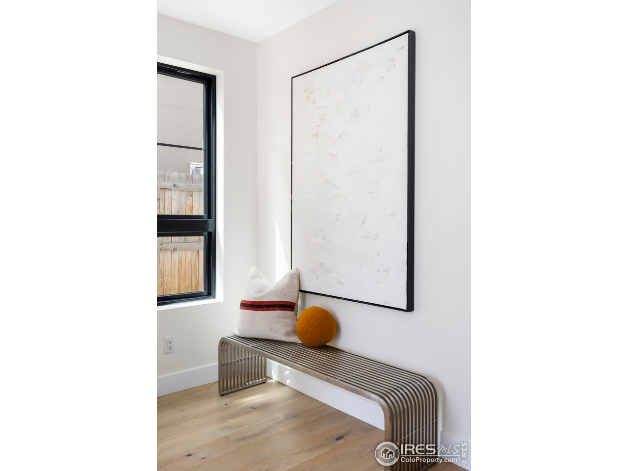 855 Eudora Street Denver, CO 80220 - Photo 4 of 37 a living room with furniture and mirror