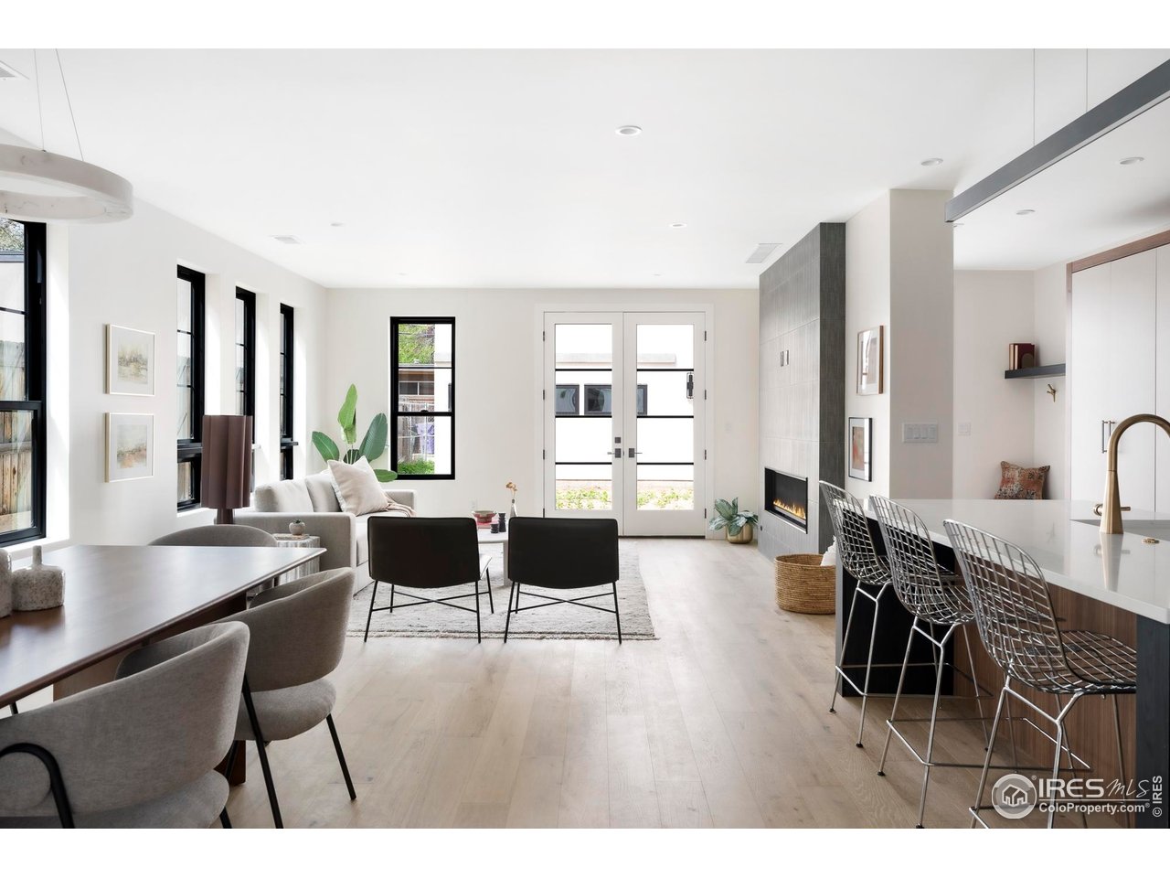 855 Eudora Street Denver, CO 80220 - Photo 6 of 37 a living room with furniture and a wooden floor