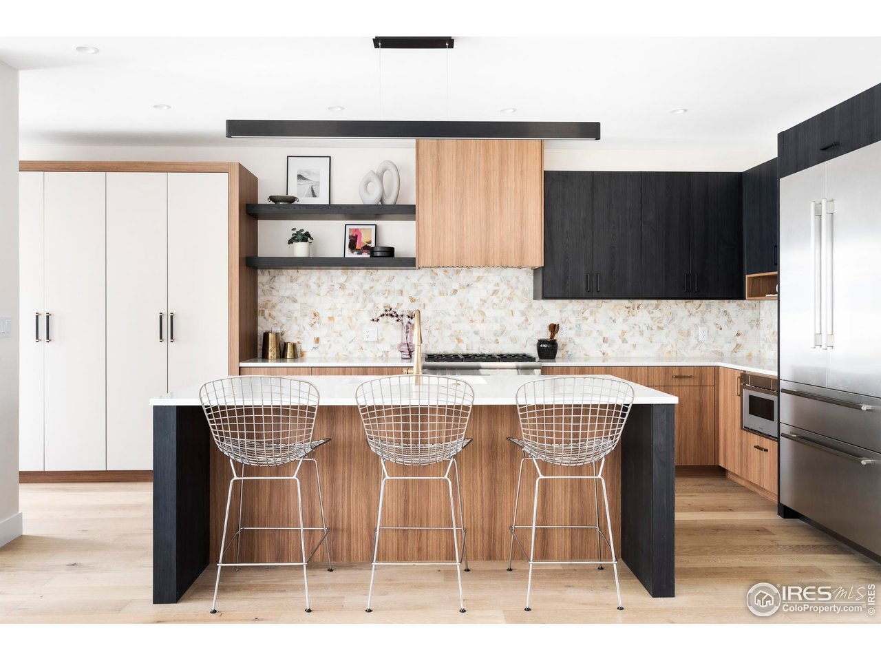 855 Eudora Street Denver, CO 80220 - Photo 7 of 37 a kitchen with a sink cabinets and window