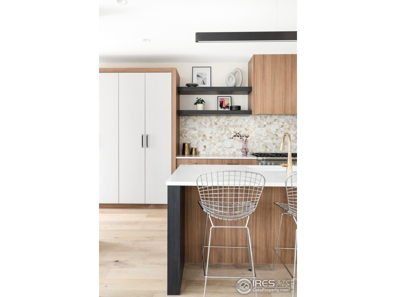 855 Eudora Street Denver, CO 80220 - Photo 8 of 37 a kitchen with a table and chair