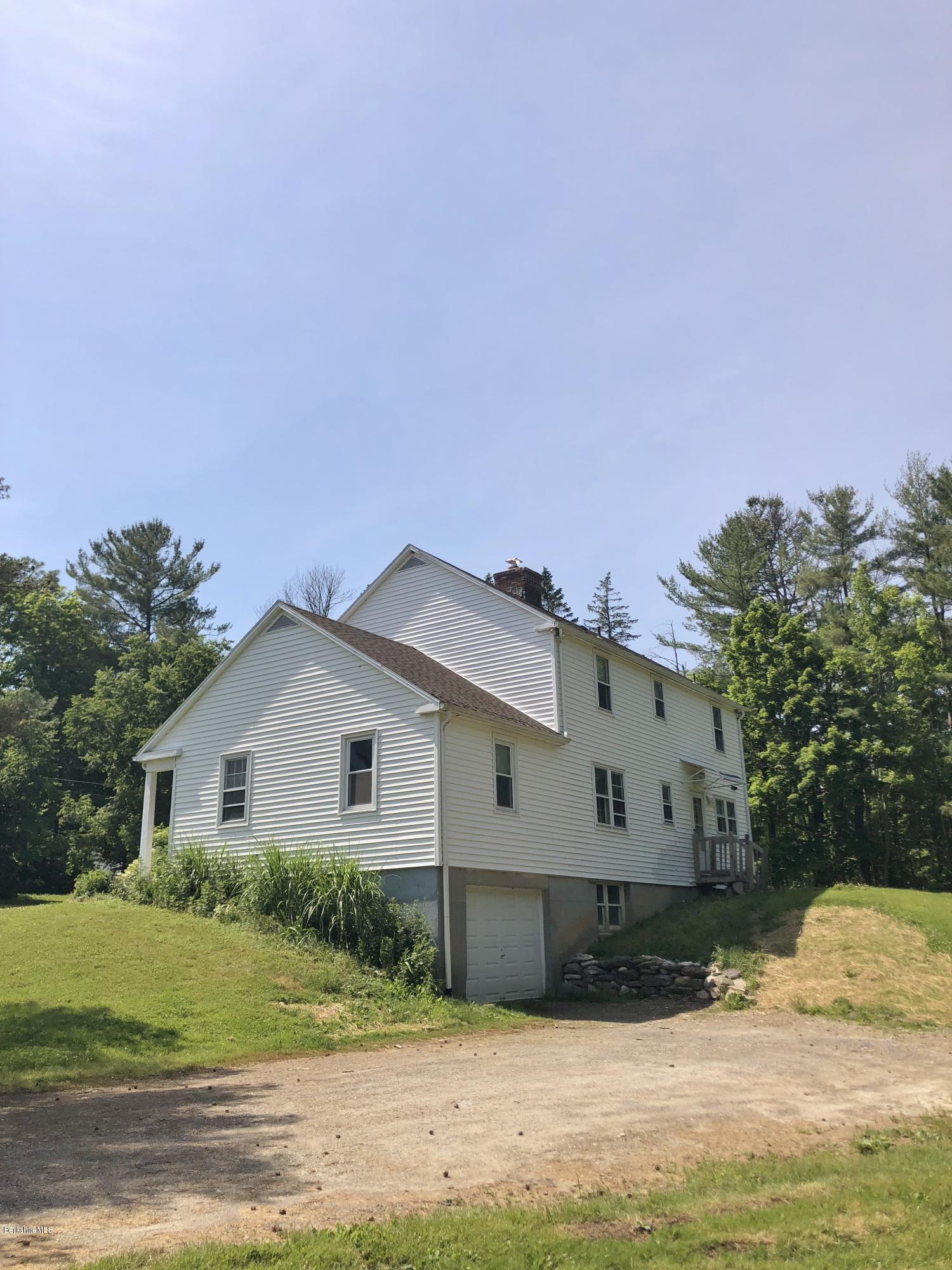 1499 State Road Richmond, MA 01254 - Photo 21 of 25 a view of a house with a yard