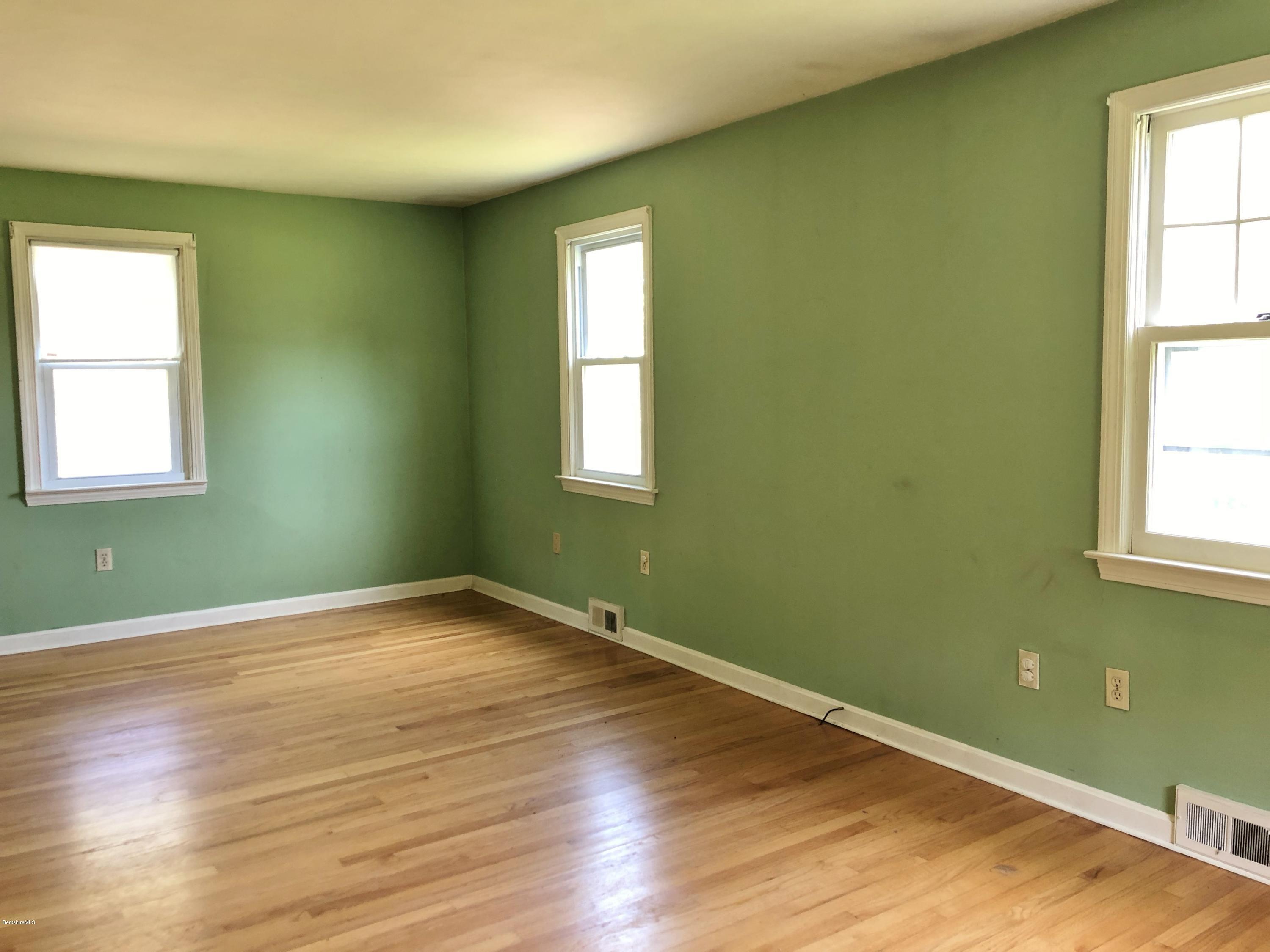 1499 State Road Richmond, MA 01254 - Photo 8 of 25 an empty room with wooden floor and windows