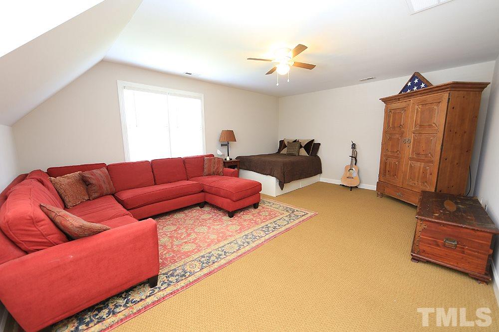 7812 Mayapple Place Raleigh, NC 27613 - Photo 20 of 30 This bedroom is generous in size, has a closet. It can be a good multifunctional room.
