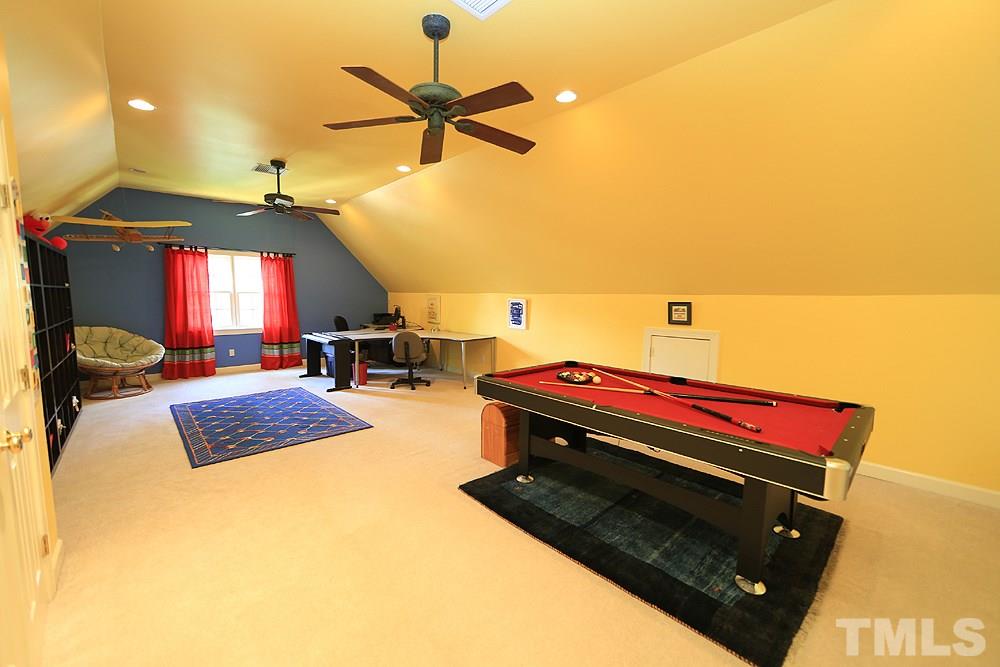 7812 Mayapple Place Raleigh, NC 27613 - Photo 21 of 30 What a great place for play or work! Two storage closets in this large room.