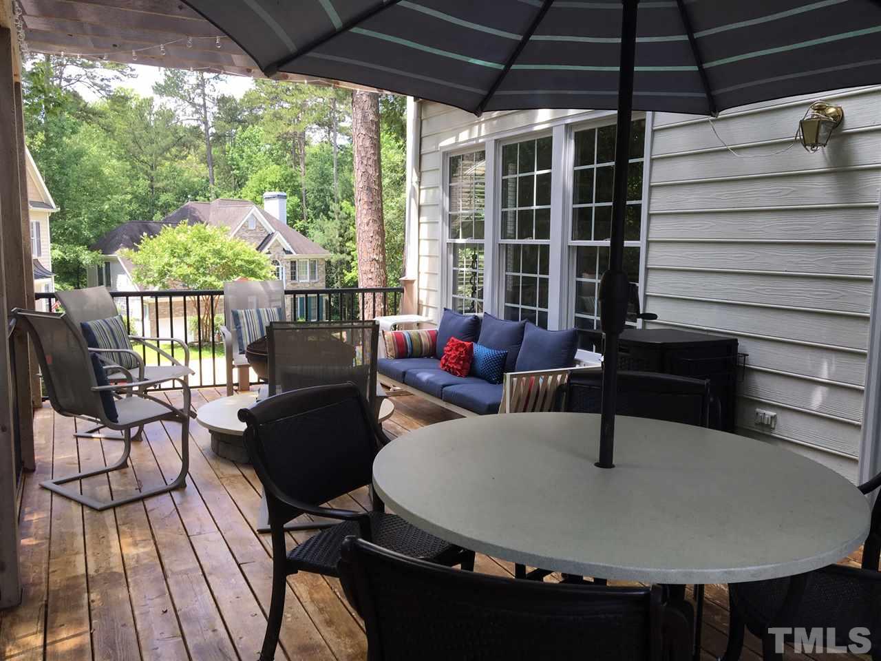 7812 Mayapple Place Raleigh, NC 27613 - Photo 24 of 30 Lots of room for enjoyment on this spacious deck!