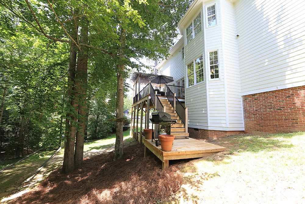 7812 Mayapple Place Raleigh, NC 27613 - Photo 25 of 30 Great place for grilling on this lower deck.