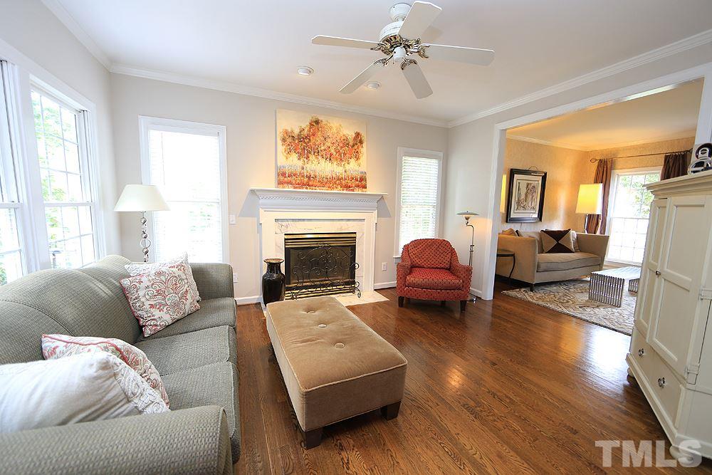 7812 Mayapple Place Raleigh, NC 27613 - Photo 7 of 30 Find a cozy spot to enjoy a little R & R in this nice room.