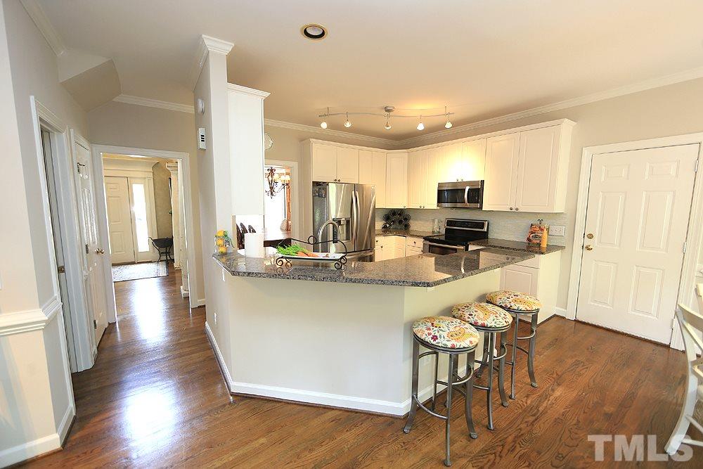 7812 Mayapple Place Raleigh, NC 27613 - Photo 8 of 30 Light and bright kitchen.