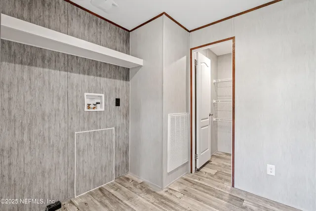 a view of a bedroom from the hallway