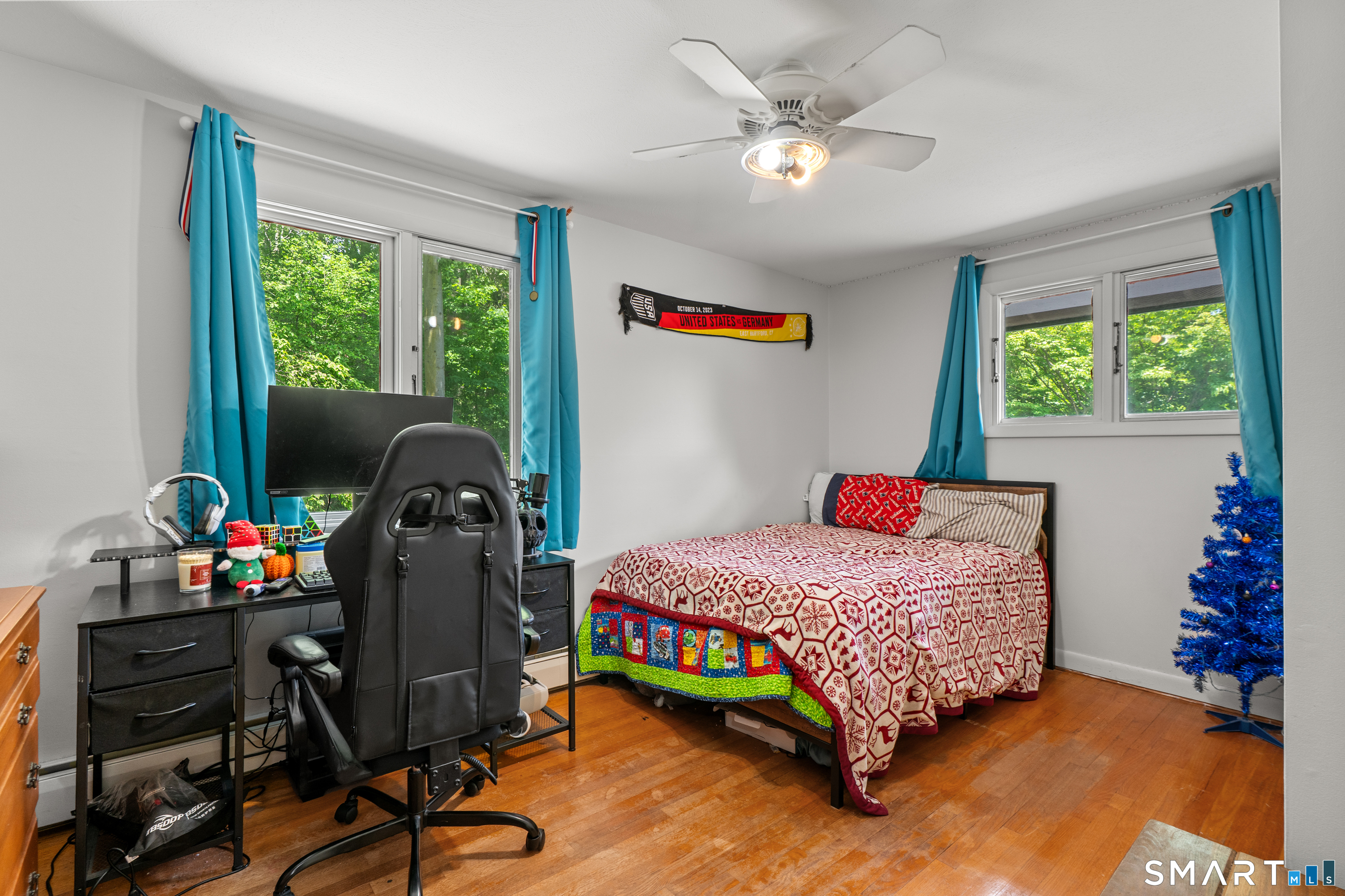 107 Round Hill Road Wethersfield, CT 06109 - Photo 30 of 40 a bedroom with a bed and a window