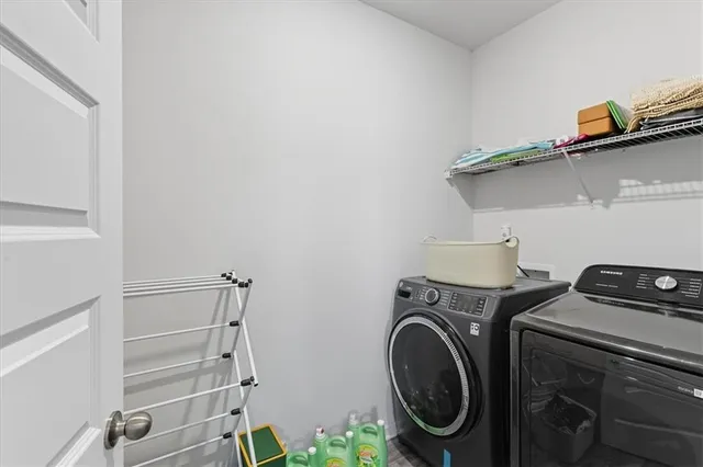 a utility room with dryer and washer