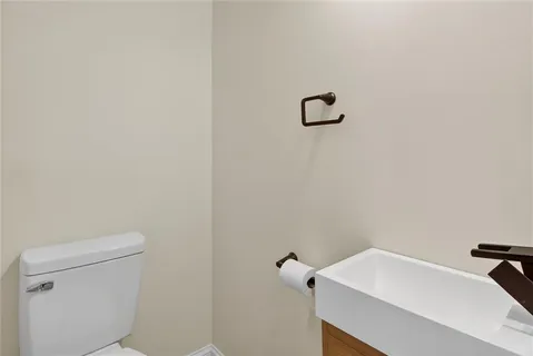 a bathroom with a sink and a toilet